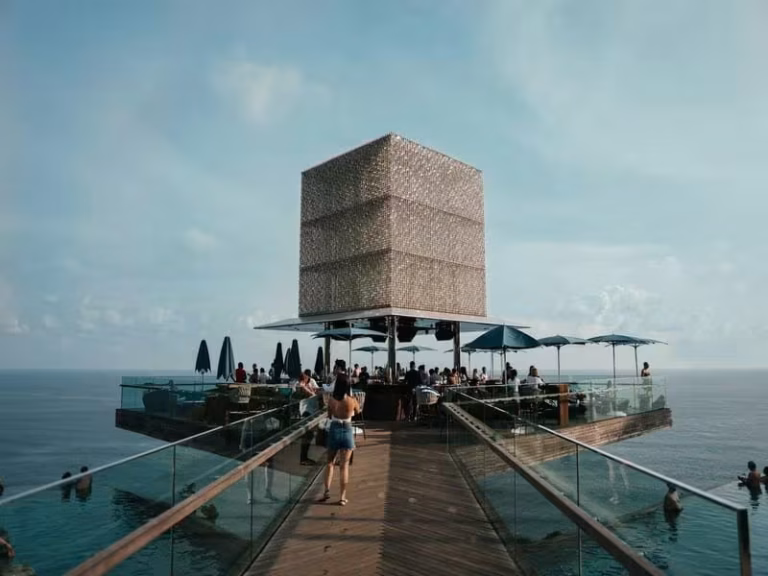 Savaya Bali dayclub in Uluwatu, showcasing its famous Cube bar, infinity pools, and expansive views of the Indian Ocean.