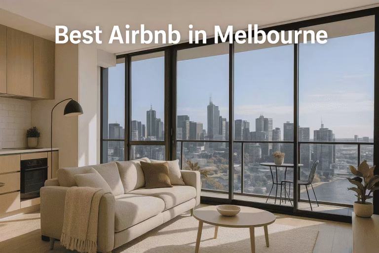 Best Airbnb in Melbourne: a contemporary apartment interior with a stunning view of the city skyline through large windows.